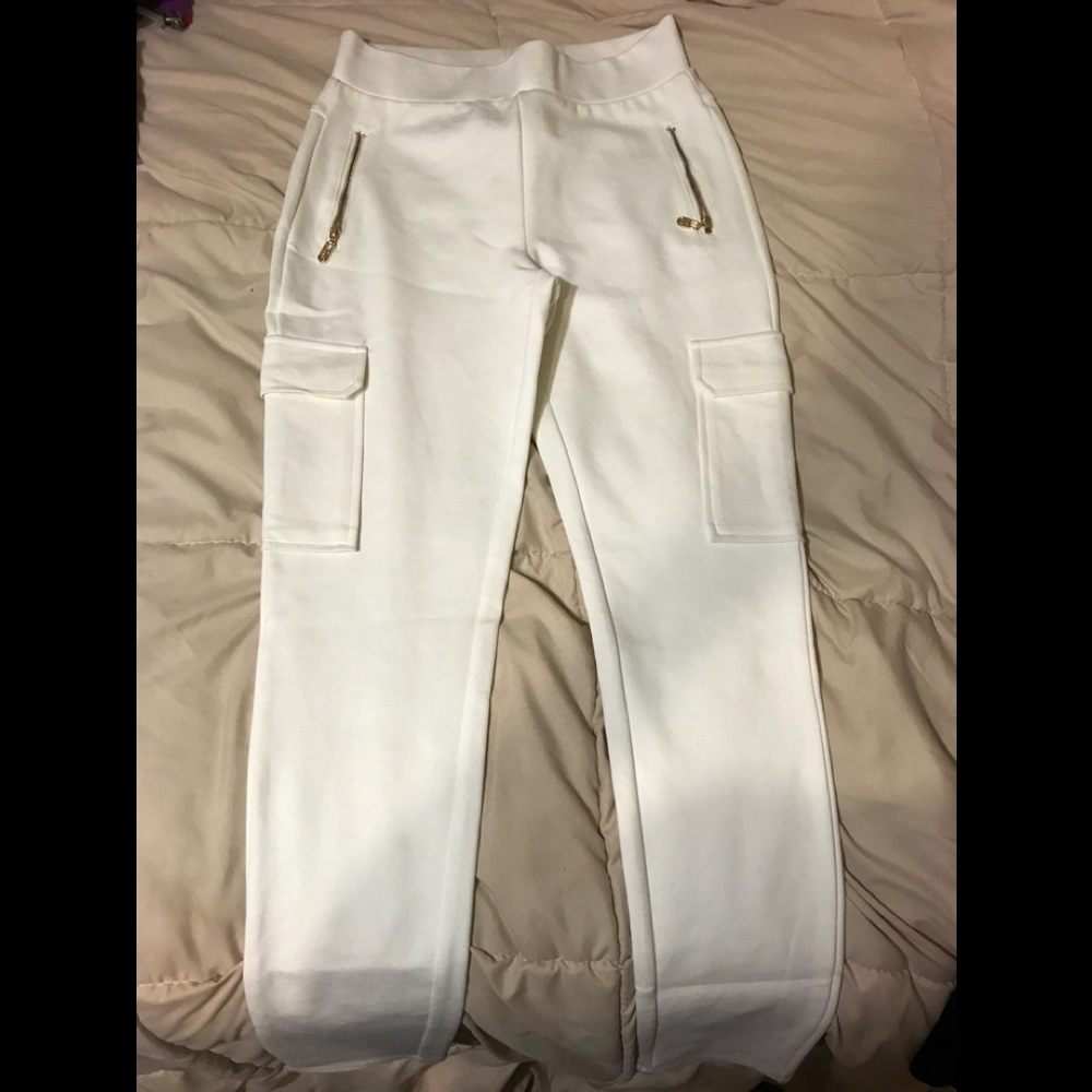 2 Pairs back and white Bebe pants